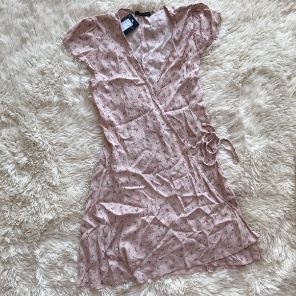 Brandy Melville Dresses & Skirts - Brandy Melville Pink Floral Robbie Wrap Dress